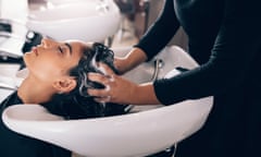 Woman getting her hair washed at a salon