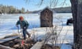 New England bob-house climate story. Ethan O'Neil, an ice fisher, pulls his bob-house off the ice in New Hampshire as the temperature warms.