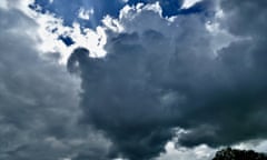 A mix of dark and light clouds in the sky on a day of sunshine and showers. Seasonal weather, Rotherfield Greys, Oxfordshire, UK - 10 May 2023