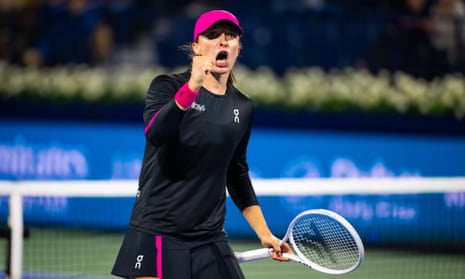 Iga Swiatek celebrates after scoring a point on day 5 of the Dubai Duty Free Tennis Championships.