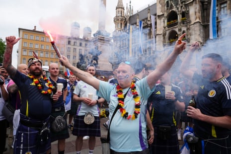 Scotland fans let off flares at Marienplatz.