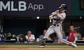 Diamondbacks left fielder Corbin Carroll (7) hits an RBI-single in the seventh inning against the Texas Rangers in Game 2 of the World Series on Saturday night.