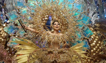 Corina Mrazek González, wearing a dazzling gold costume, is crowned carnival queen in the Canary Islands