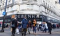 Shoppers outside a Debenhams store