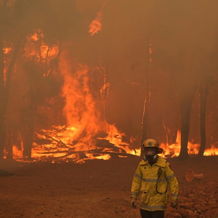 A firefighter tackling a blaze near Perth, Western Australia, during the 2020 wildfires.