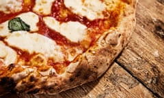 Pizza on a rustic table