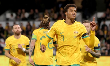 Kusini Yengi of Australia celebrates after scoring one of his goals in the World Cup Qualifier against Palestine in Perth.