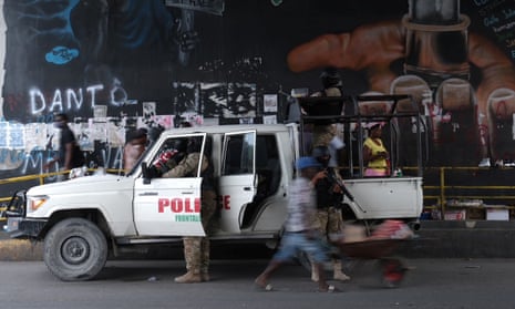 Haitian police standing guard in Port-au-Prince on Monday as protests were planned after the assassination of President Jovenel Moïse.