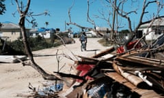 Antigua And Barbuda Struggle To Recover Months After Devastating Hurricanes<br>CODRINGTON, BARBUDA - DECEMBER 08: Debris from damaged homes lines a street on the nearly destroyed island of Barbuda on December 8, 2017 in Cordington, Barbuda. Barbuda, which covers only 62 square miles, was nearly leveled when Hurricane Irma made landfall with 185mph winds on the night of September six. Only two days later, fearing Barbuda would be hit again by Hurricane Jose, the prime minister ordered an evacuation of all 1,800 residents of the island. Most are now still in shelters scattered around Barbuda’s much larger sister island Antigua. (Photo by Spencer Platt/Getty Images)