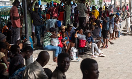 Haitians fleeing their neighborhoods due to gang violence in Port-au-Prince.