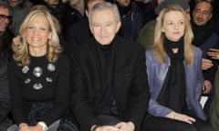Helene Arnault, Bernard Arnault and Delphine Arnault at a 2013 Christian Dior show in Paris.