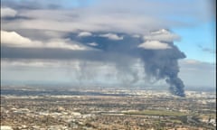 A large chemical fire in Derrimut , west of Melbourne , as seen from the air as designer Kate Case  flew into Melbourne. this morning . 10th July 2024.  Australia