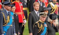 FILE - King Charles III, front right, Camilla, the Queen Consort, Prince Harry and Prince William watch as the coffin of Queen Elizabeth II is placed into the hearse following the state funeral service in Westminster Abbey in central London Monday Sept. 19, 2022. King Charles III has been diagnosed with a form of cancer and has begun treatment, Buckingham Palace says on Monday, Feb. 5, 2024. (AP Photo/Martin Meissner, Pool, File)