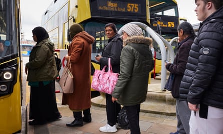 Bus passengers at Bolton Interchange