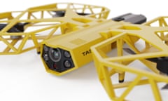 A computer-generated conceptual design of Axon’s Taser drone, with yellow scaffolding enclosing the camera and wing blades.