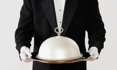 Waiter holding silver salver