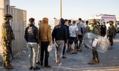 Young people are returned to the Moroccan side of the border with Spain