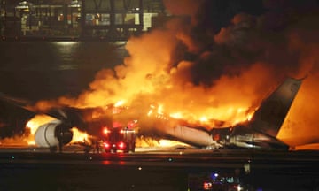 JAL passenger plane bursts into flames at Haneda Airport in Tokyo