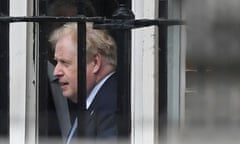 Boris Johnson leaves from the back entrance of Downing Street.