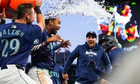 The Mariners celebrate an extra inning victory over the White Sox earlier this season.