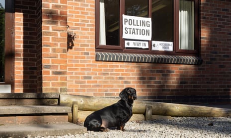 Pickle the Daschund waits for his owner outside Ticknall Village hall.