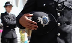 A newly qualified Metropolitan police officer in Hendon, England.