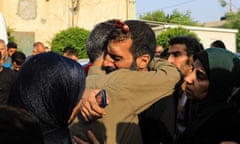 A Palestinian man weeps for the death of his relatives, 24 October 2023