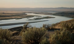 The Columbia River flows next to a decommissioned nuclear production complex in Washington state.