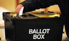 A vote is cast in a ballot box