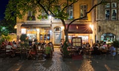 Outdoor terrace of a traditional 'bouchon' restaurant in Lyon