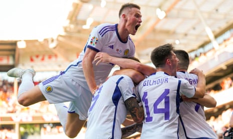 Scotland celebrate Lydon Dykes’ late equaliser.