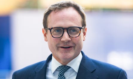 Head and shoulders shot of Tom Tugendhat, who is wearing glasses