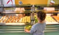 A student chooses her lunch at school