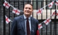 Wes Streeting outside Downing Street with England flags in the background