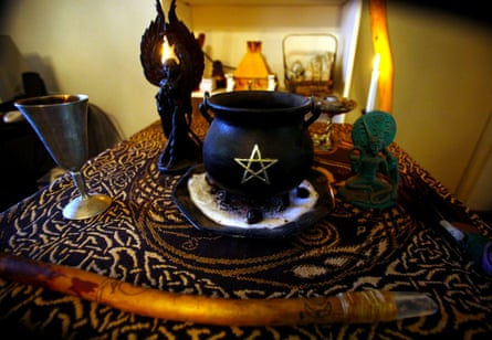 Rudy Alderette’s altar in his Fresno, California home includes a cauldron with a pentagram, a wand, chalice, statues of the Wiccan god and goddess and incense holder.