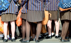 Anonymous schoolgirls in their uniform in Trafalgar Square, London.