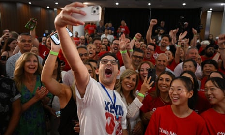 Labor supporters celebrate as Chris Minns and NSW Labor win the election.