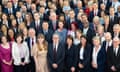 Keir Stramer standing in the centre of the front row of a group of Labour MPs