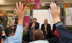 Prime Minister Malcolm Turnbull (centre right) with fedeMalcolm Turnbull and Craig Laundy (centre left) with students at Strathfield North public school in Sydne