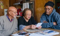 Programme Name: Enslaved with Samuel L. Jackson - TX: 11/10/2020 - Episode: Enslaved - ep1 (No. 1) - Picture Shows: *|PHOTOGRAPHER MUST BE CREDITED|* looks over a family tree with his cousins Arthur and Hilda in Rome, GA. Samuel L. Jackson - (C) Associated Producers Ltd./Cornelia Street Productions - Photographer: Sabrina Lantos