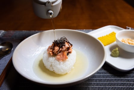 Ochazuke by Kantaro Okada: rice in a bonito and sencha broth, topped with grilled salmon and shio kombu (seasoned kelp) and served with takuan (pickled daikon radish), wasabi and tempura bits.