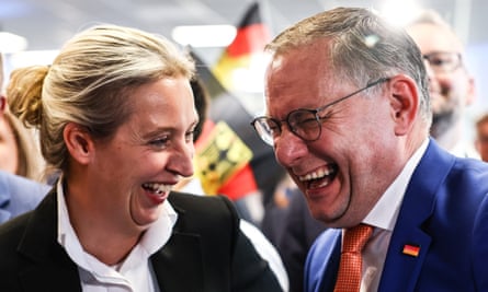 Alternative for Germany (AfD) co-chairman Tino Chrupalla (R) and deputy chairwoman Alice Weidel (L) celebrate after European elections in Berlin