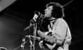 Leonard Cohen performing on stage at the Isle of Wight Festival in August 1970. 