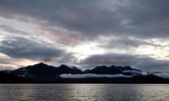 Lake Manapouri at sunset on a cloudy day