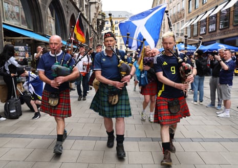 Scotland fans play bagpipes in Munich.