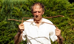 A water diviner, using copper rods.