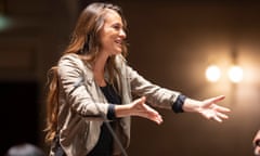 Nicola Benedetti extending her arms on stage