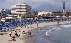 People on the beach at Marbella