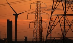 Wind turbines and electricity pylons in Runcorn.