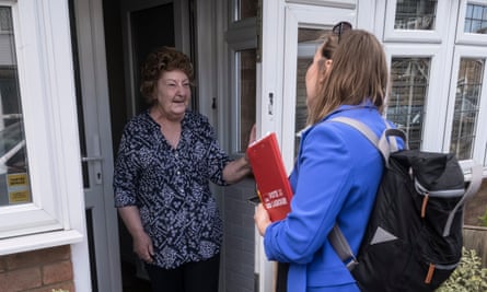 Pauline Harris on her doorstep with Jen Craft